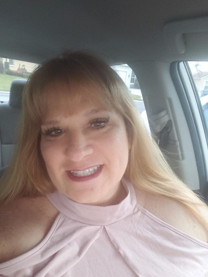 New Teacher Mrs. Hulse Sits in Car and Smiles for Picture