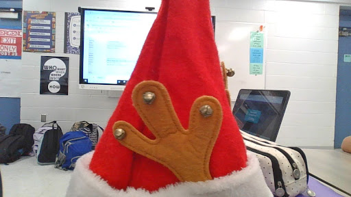 A festive Santa hat with reindeer ears