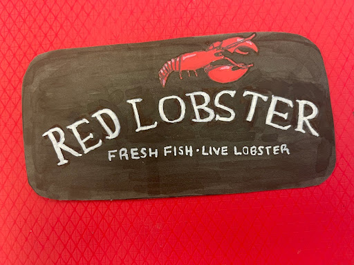 A drawing of the Red Lobster logo.
