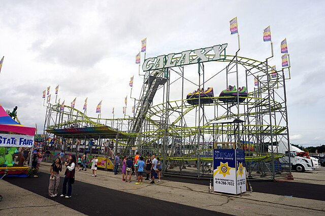 Picture of a roller coaster at a fair.