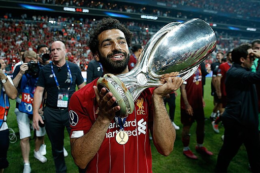 Picture of Salah Holding Trophy