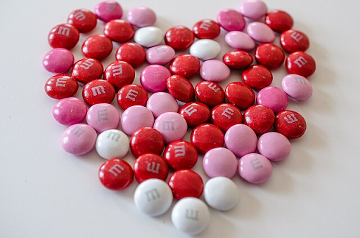 M&Ms in the shape of a heart
