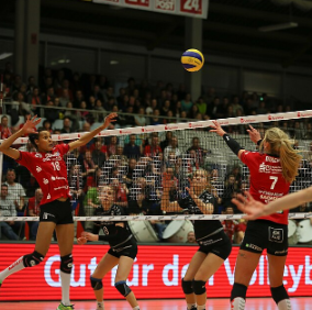Photo of a volleyball match
