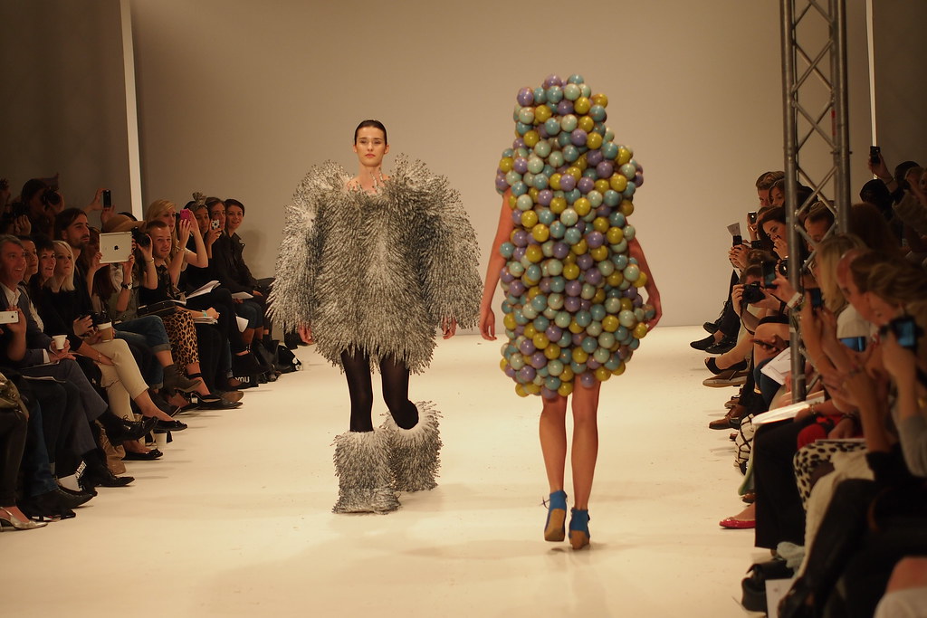  Photo of two outfits that were at London Fashion Week.