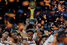 Image of a basketball team winning their Championship